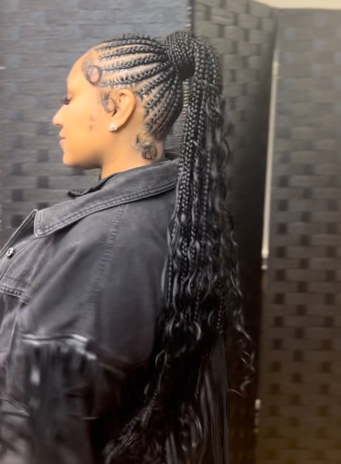 Feed-in braids into a high braided ponytail with curly ends